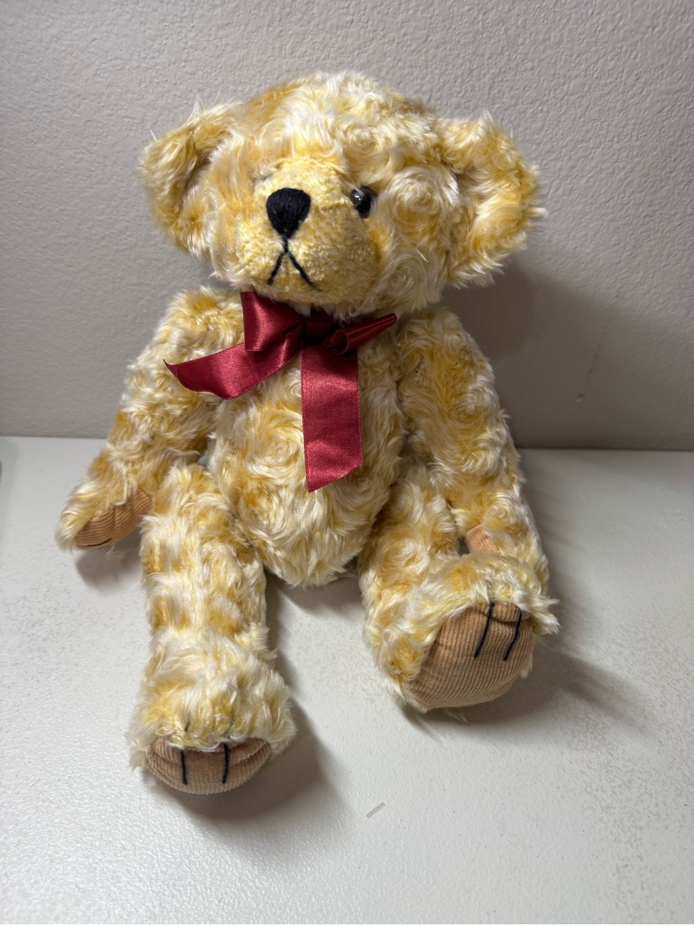 Stanley Curly Yellow Plush Teddy with Red Bow